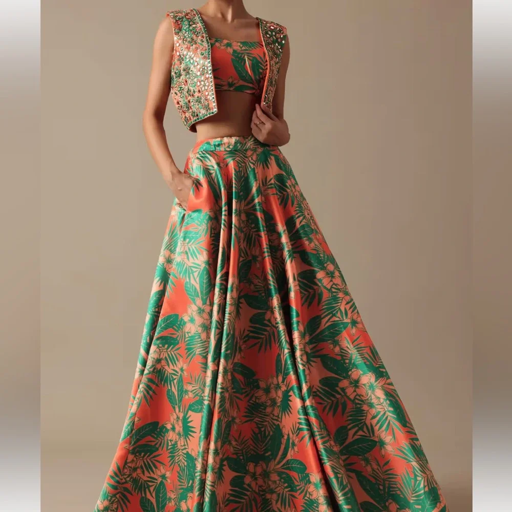 Kalki Orange and Green Embellished Lehenga Set - Picture 3 of 13